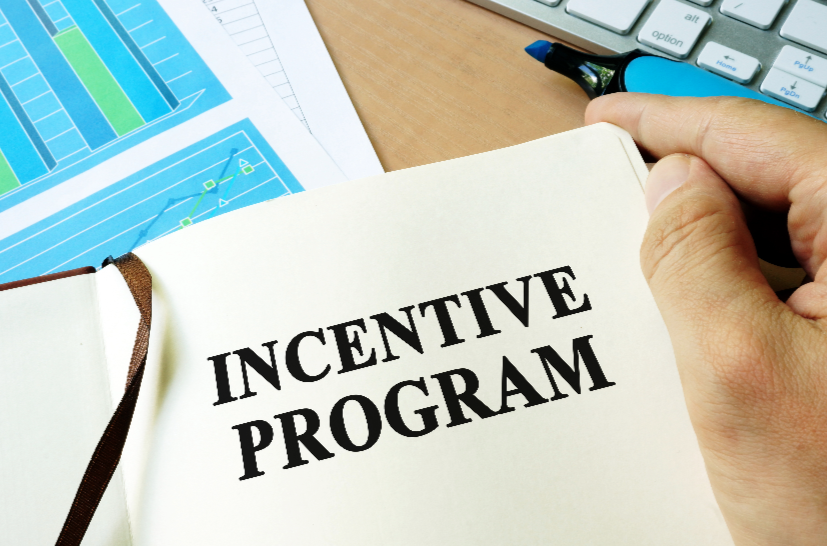 an open book that reads incentive program