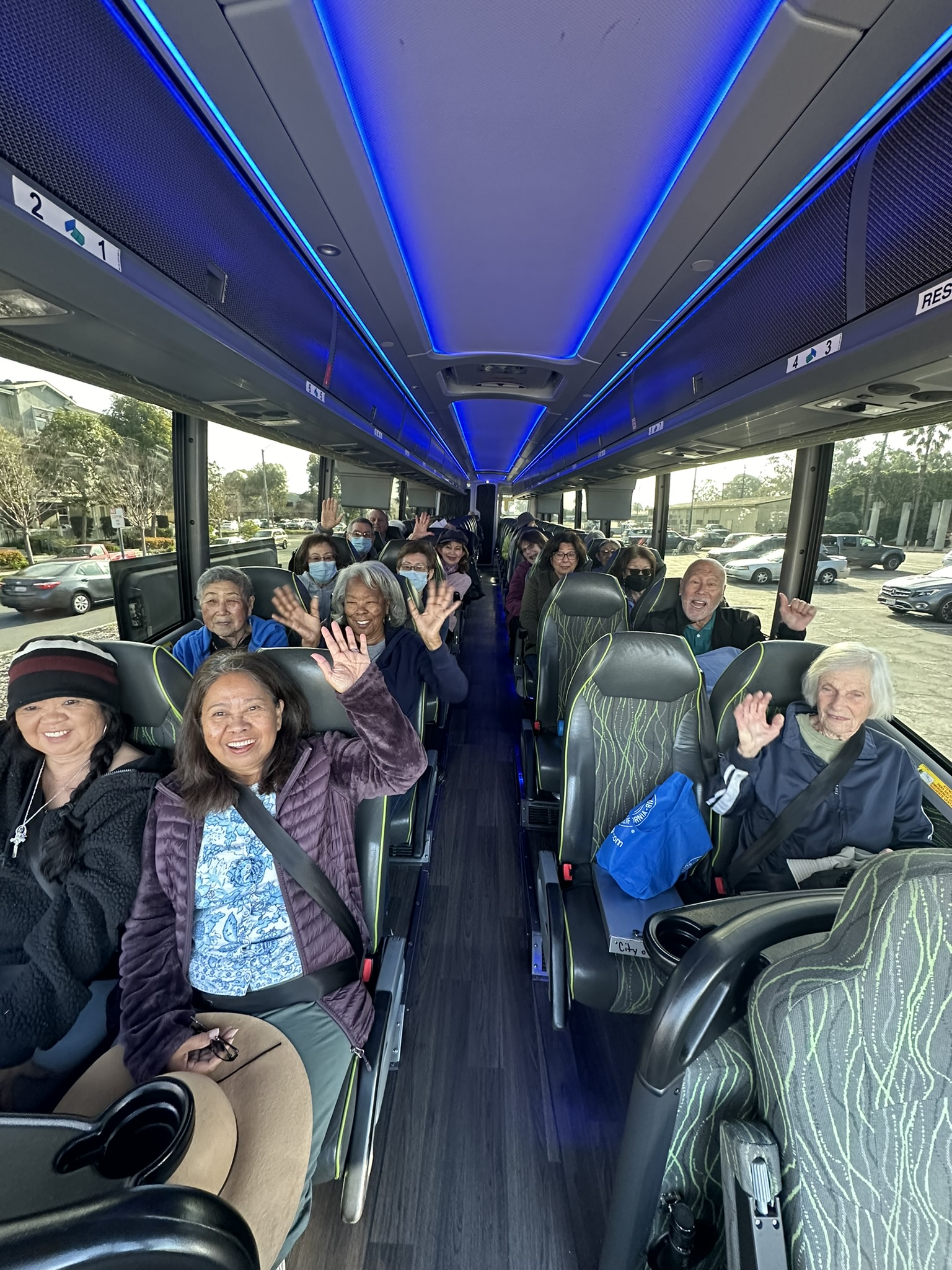 Image of Seniro Citizens siting on a bus